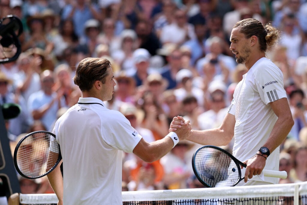 Alexander Zverev and Arthur Fery shake hands.