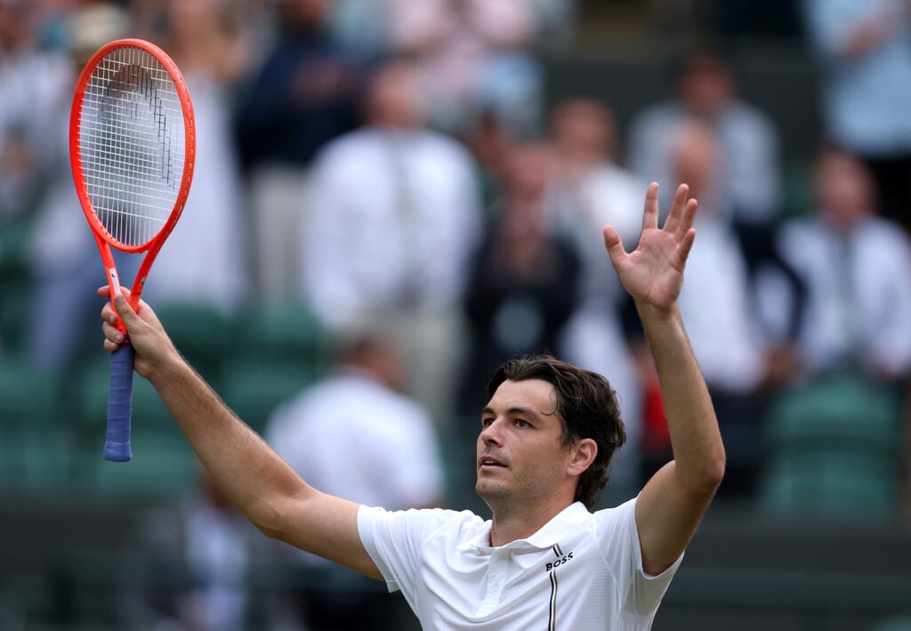 Taylor Fritz celebrates after reaching the Wimbledon quarterfinals in 2026.