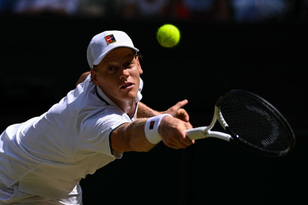 Jannik Sinner in action at Wimbledon in 2026.