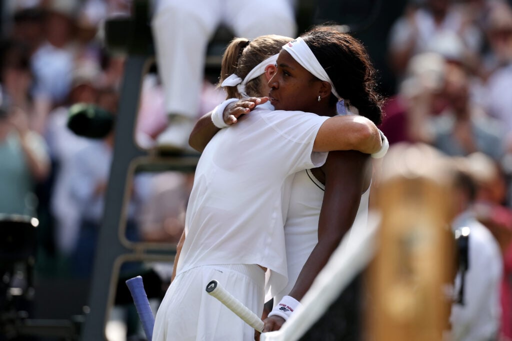 Karolina Muchova and Coco Gauff embrace.