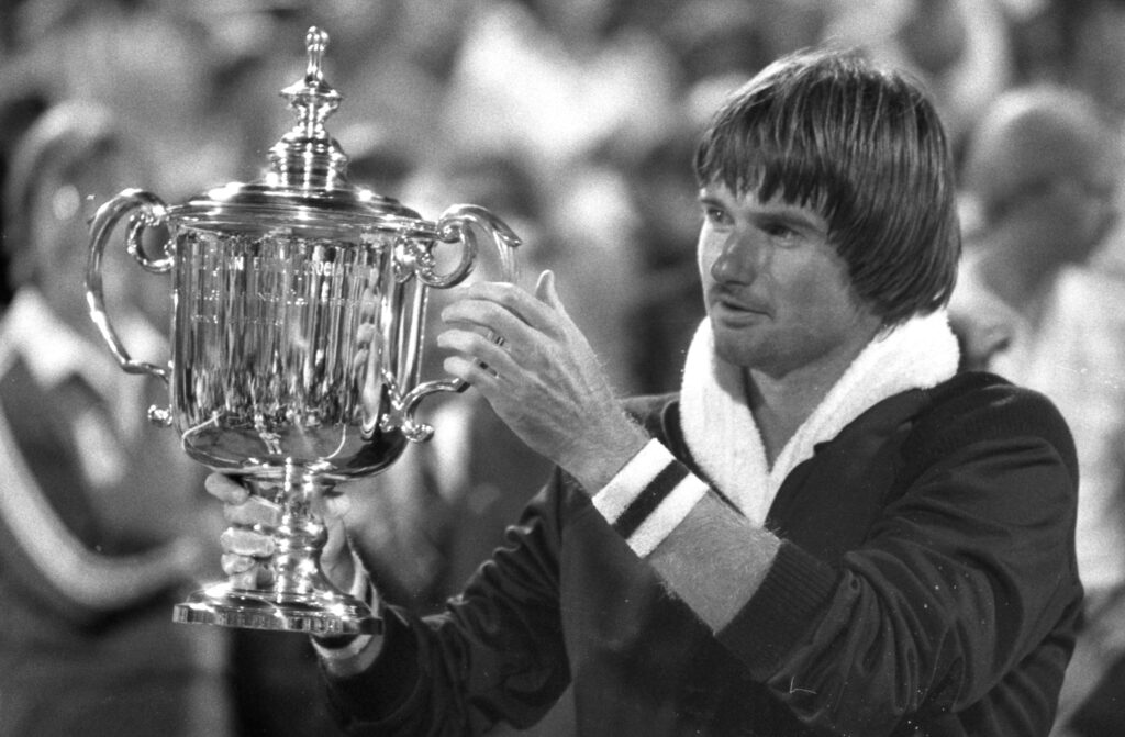 Jimmy Connors holding the US Open title.